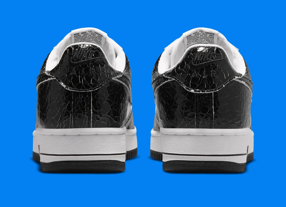 Nike AF1 01 Cracked Leather black colorway JA0248-300 on feet lifestyle