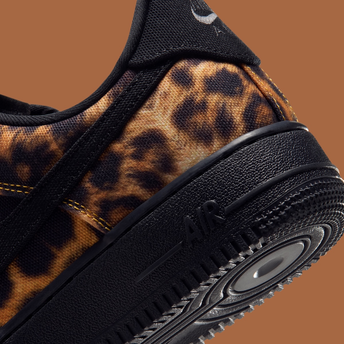 Nike AF1 Low Leopard side angle showing canvas leopard print upper