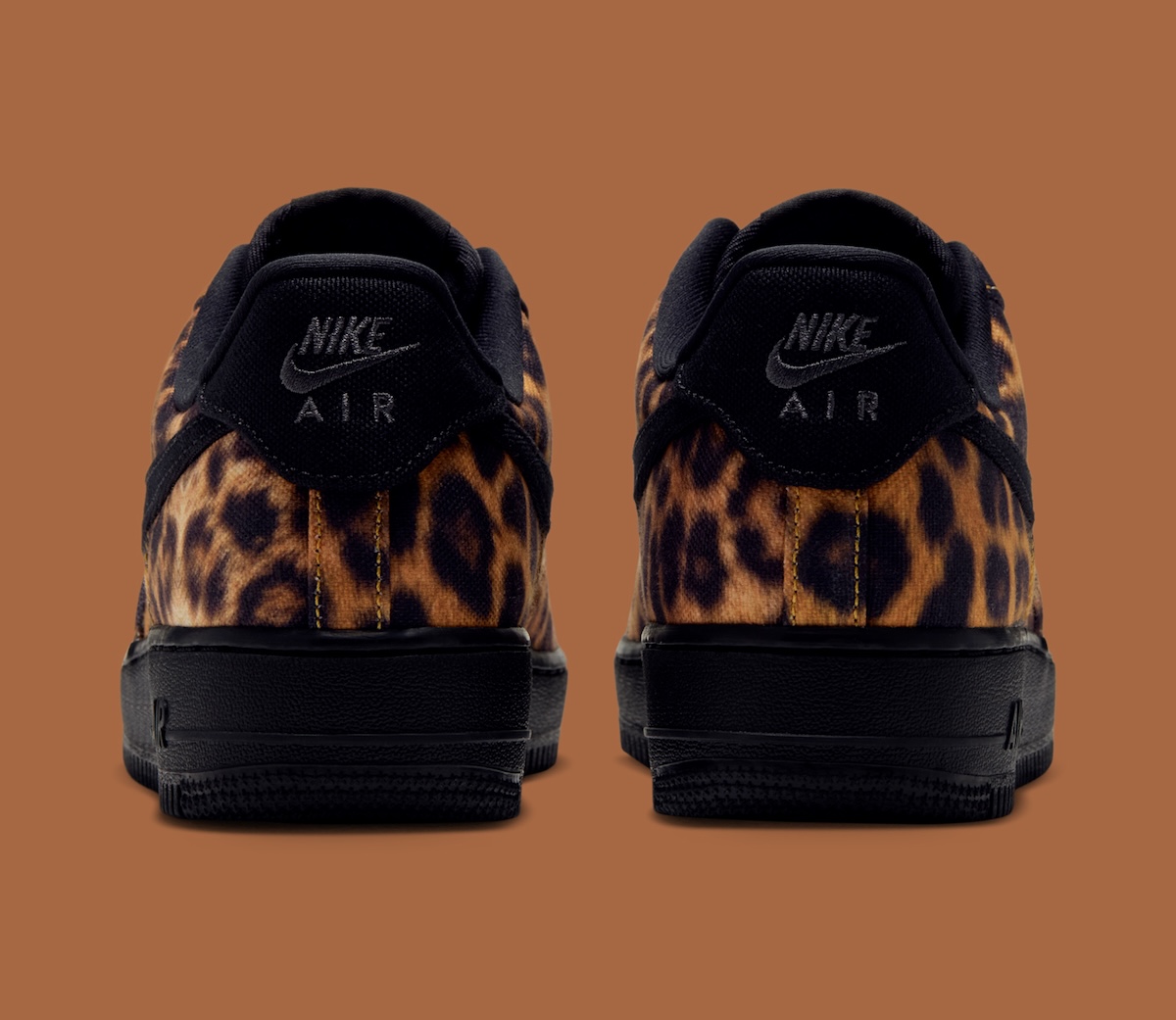 Nike AF1 Low Leopard JA5714-900 side profile with black Swoosh