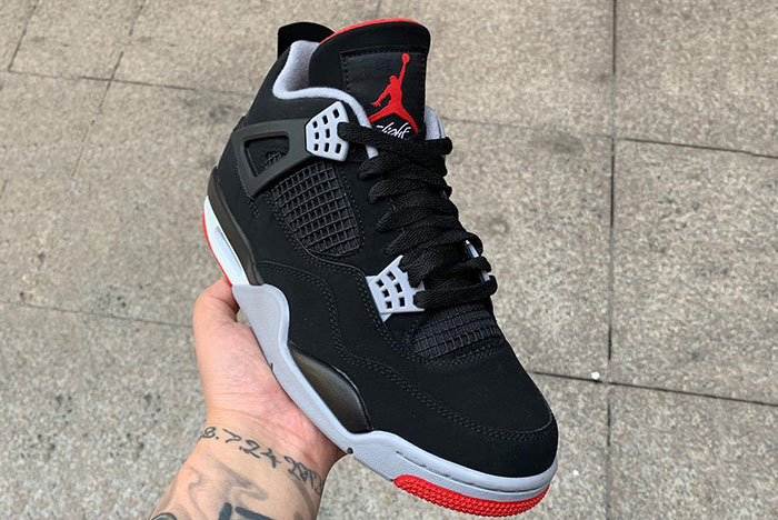 Air Jordan 4 Bred 2019 308497-060 pair shot showing both shoes in detail