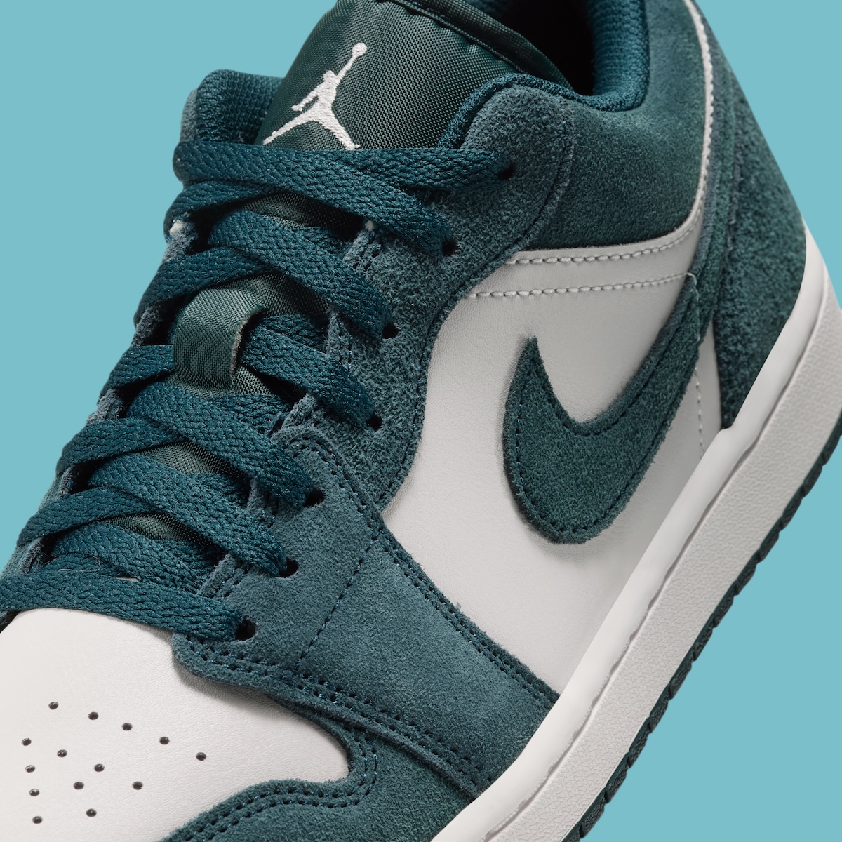 Air Jordan 1 Low Midnight Spruce side profile showing suede overlays
