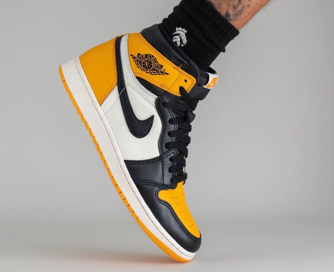 Air Jordan 1 Yellow Toe on feet side profile
