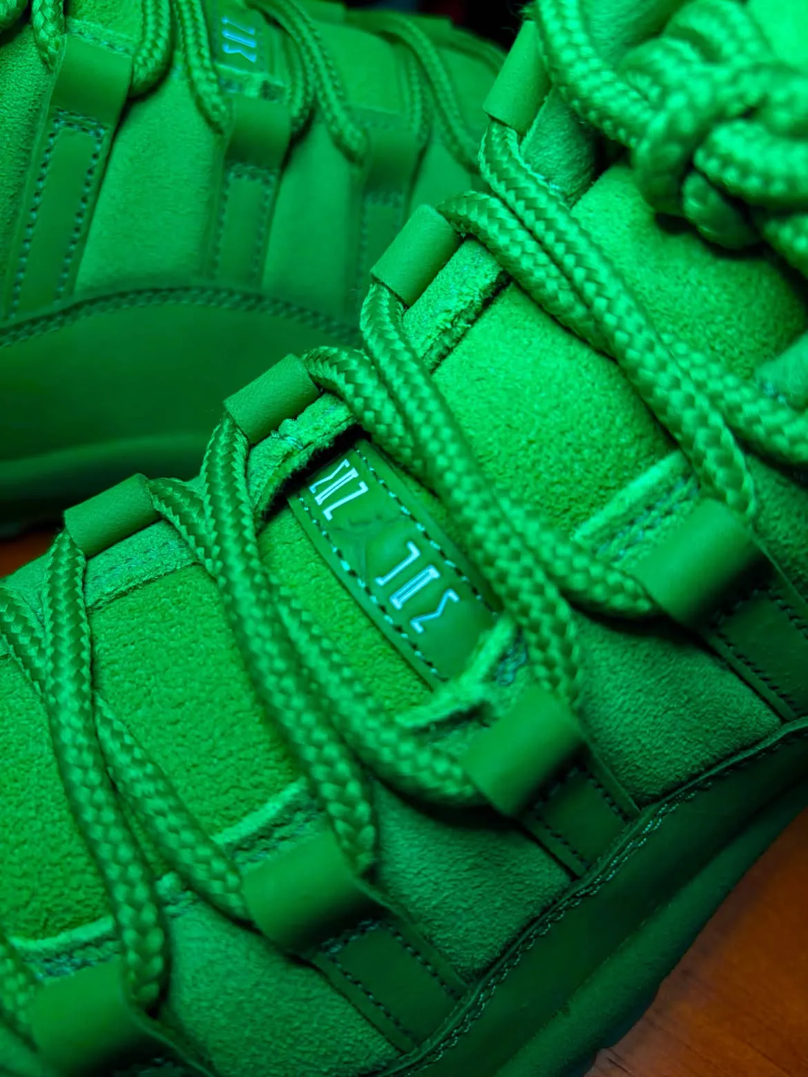 Air Jordan 11 Green Screen suede upper and tonal green materials
