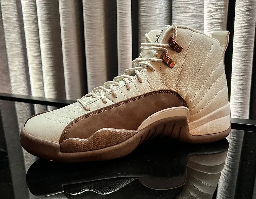 Air Jordan 12 Fireside close up of metallic bronze eyelets and tongue branding