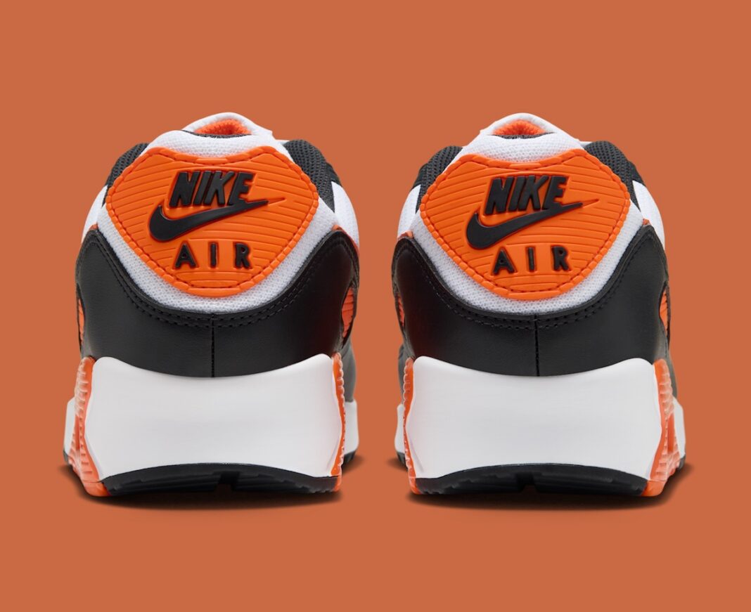 Nike AM90 Halloween 2026 back view showing orange heel tab and Air Max window