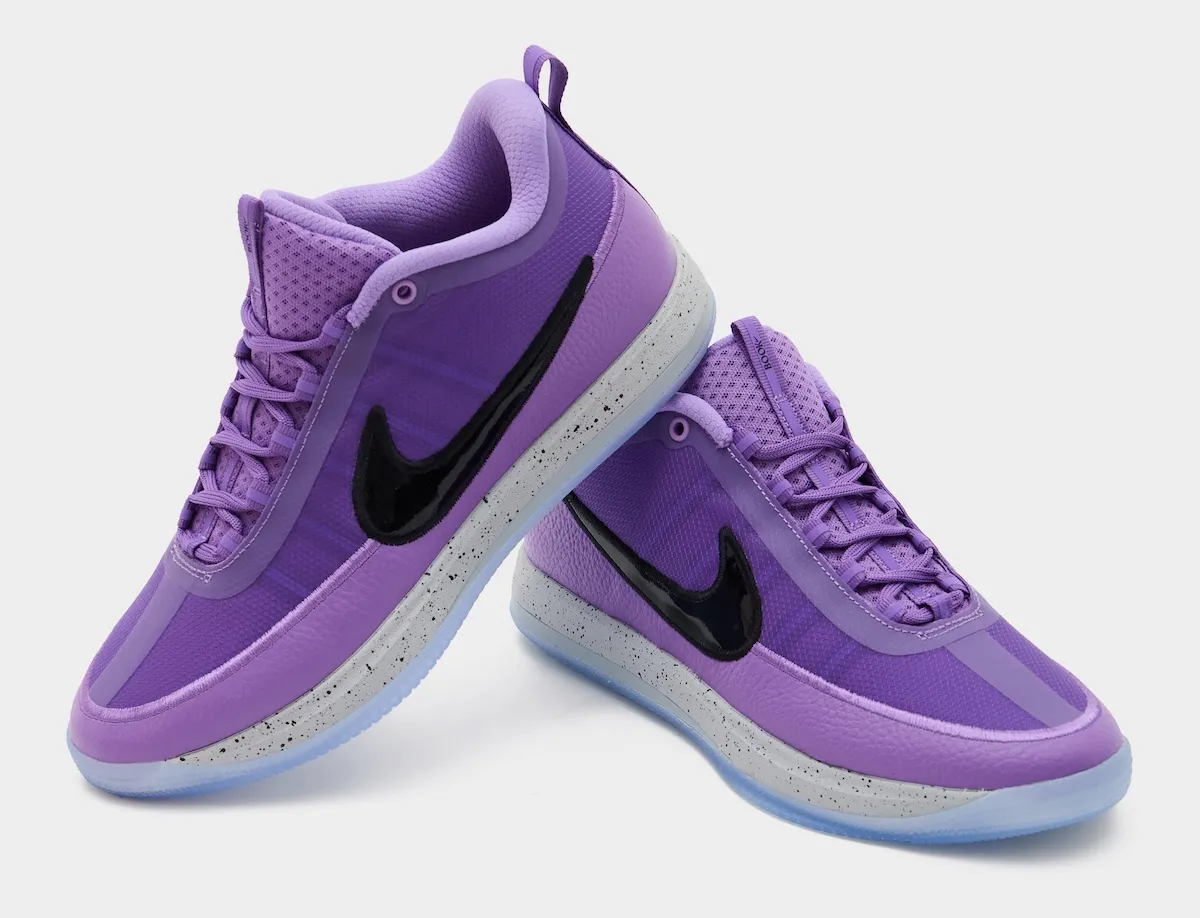 Nike Book 2 Be Legendary close up of tongue branding and purple laces