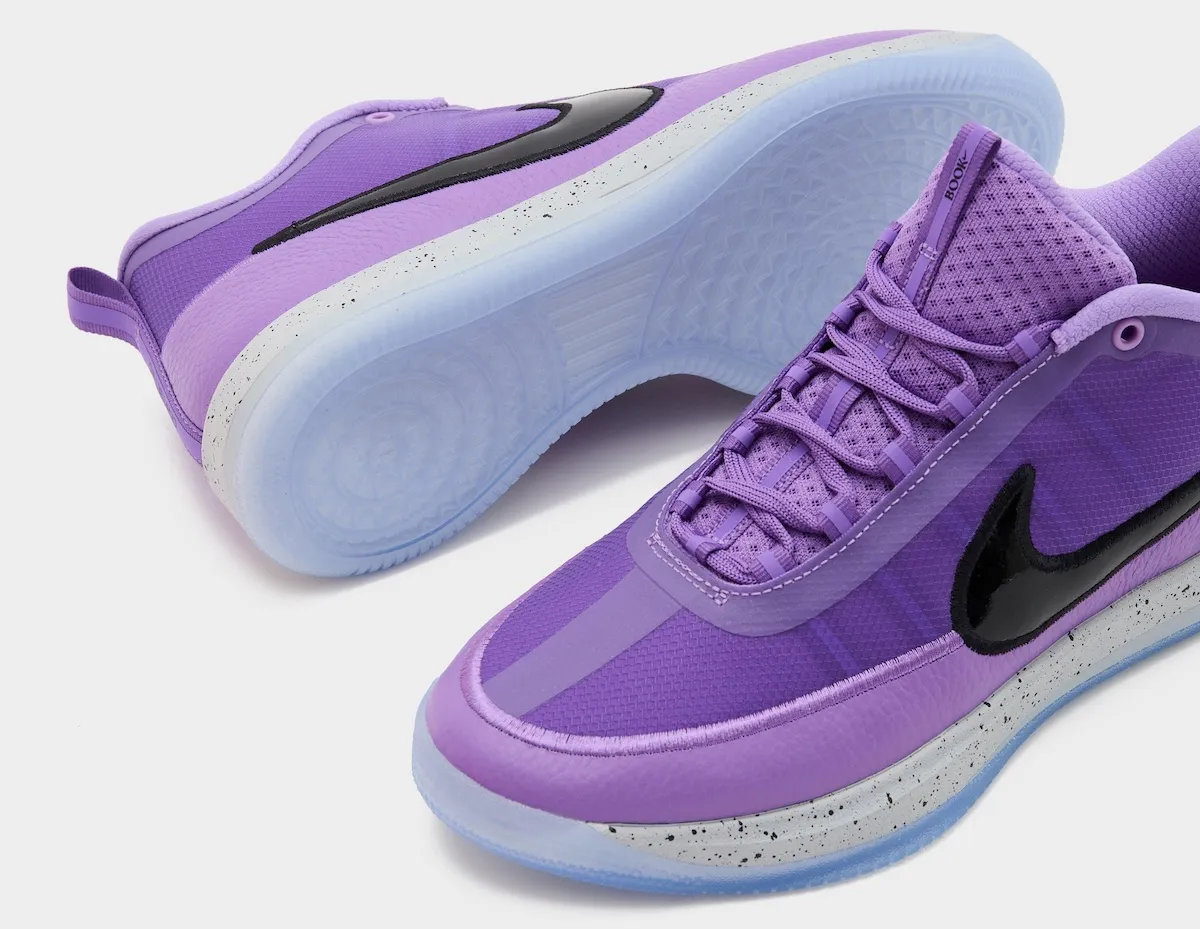 Nike Book 2 Be Legendary angled view showing full upper construction and speckled midsole