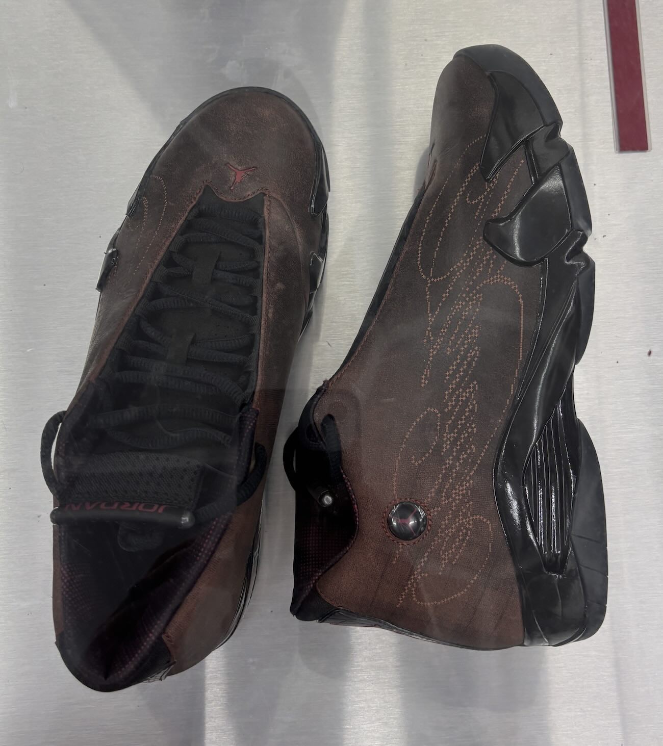 Mowalola Air Jordan 14 brown leather with laser-etched tartan pattern