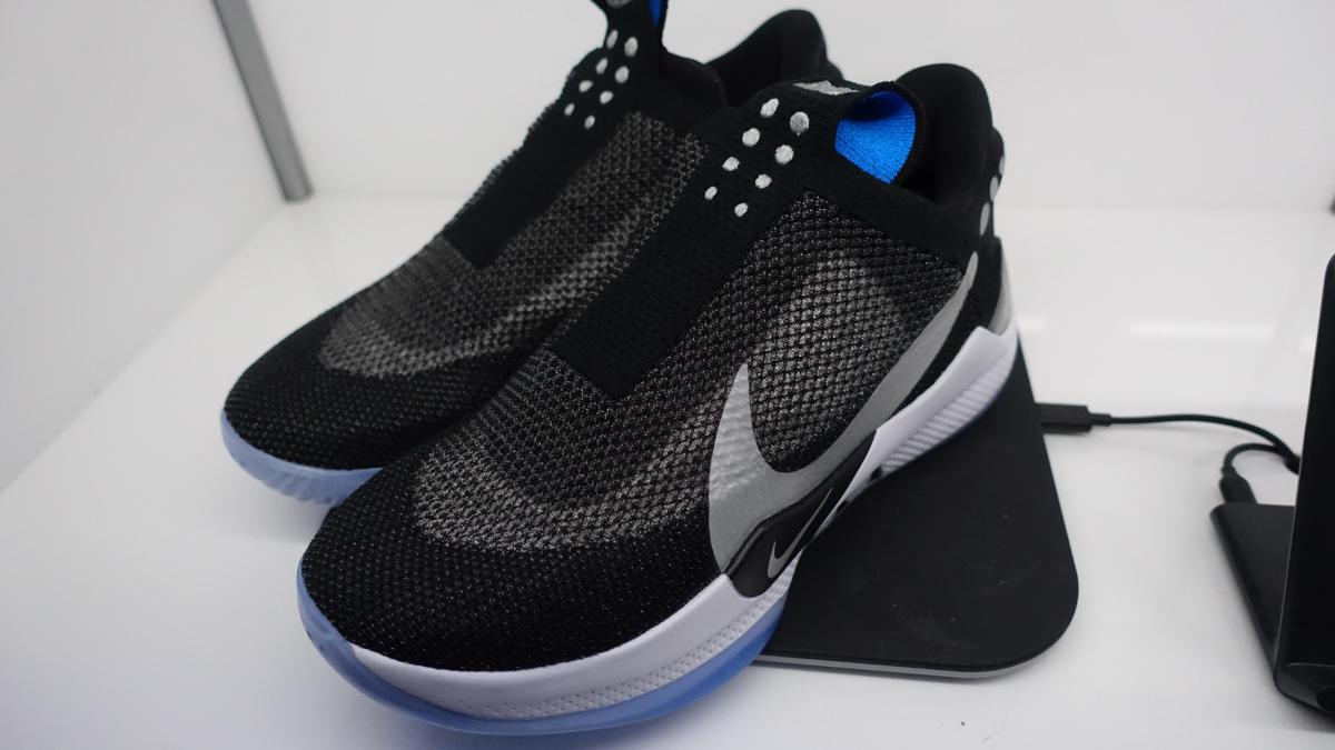 Nike Adapt BB on wireless charging pad with app controls