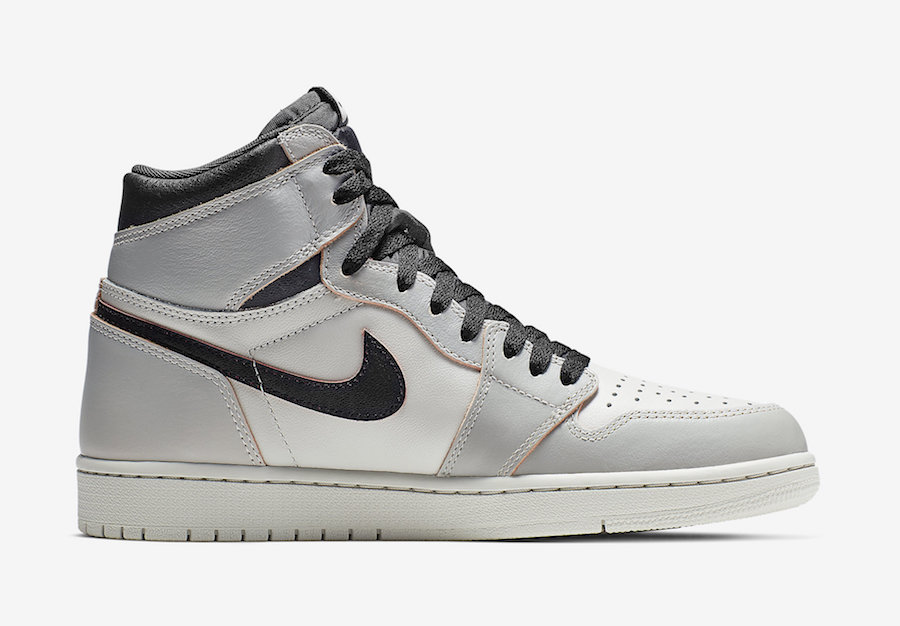 Nike SB x Air Jordan 1 Light Bone worn away revealing pink underlayer