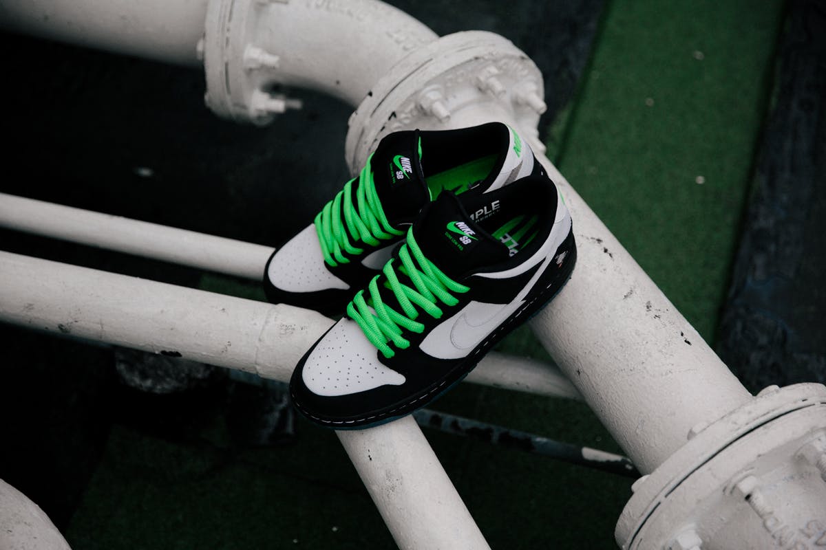 Staple x Nike SB Dunk Panda Pigeon full pair lifestyle