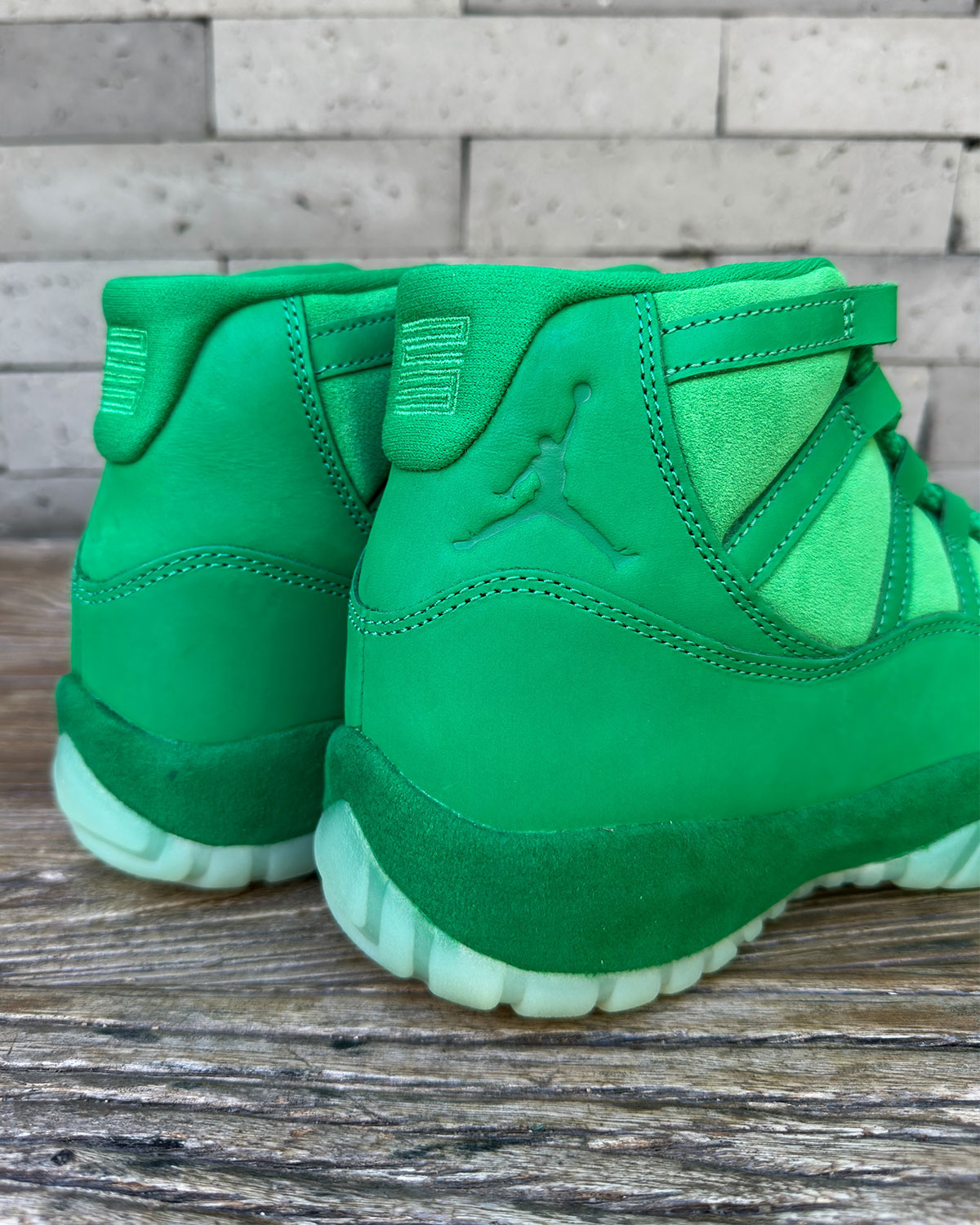 Air Jordan 11 Green Screen heel view showing tonal 23 branding and Jumpman logo